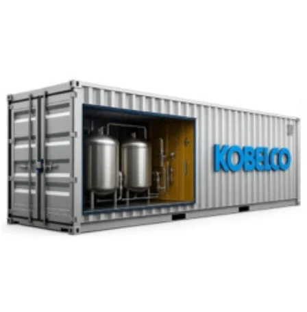 KOBELCOのロゴが入ったコンテナ型の産業設備。内部には2つの大きな金属製タンクと配管が設置されている。